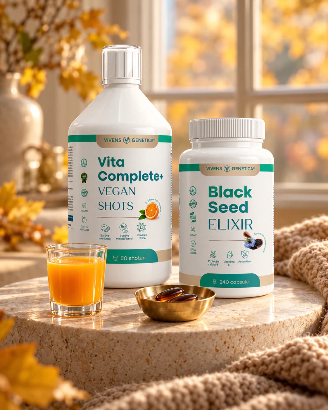 Sticla Vita Complete+ Vegan Shots de 500 ml și borcanul Black Seed Elixir cu 240 de capsule, pe un postament de piatră, cu un pahar mic cu shot portocaliu și două capsule într-un bol de alamă, în lumina unei dimineți de toamnă
